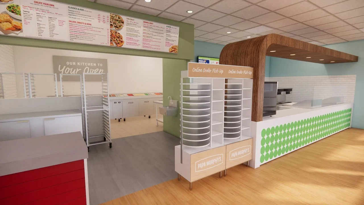 Pizza restaurant counter with online-order pickup shelves and menu boards.