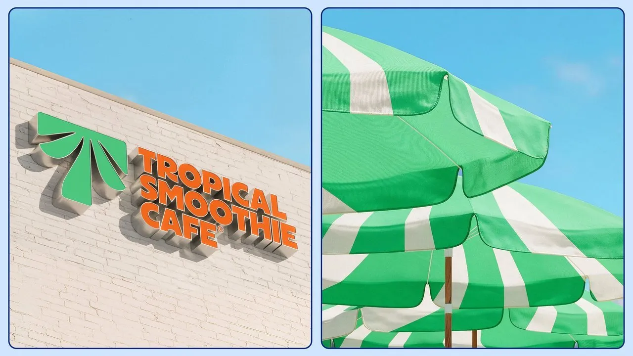 Tropical Smoothie Cafe sign beside green-and-white striped patio umbrellas against a blue sky