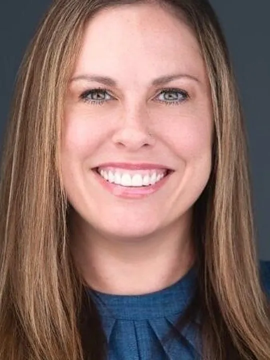 Two women pictured side by side against dark backgrounds